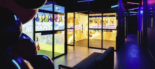 People playing inside an Immersive Gamebox room