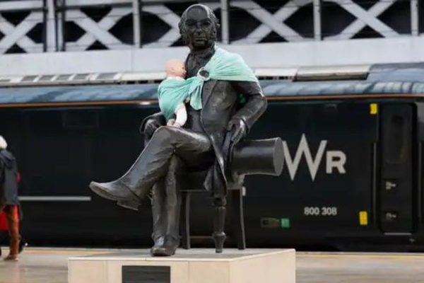 UK Non-Profit Ties Baby Slings on Statues to Fight for Paternity Leave: Baby carrier on statues