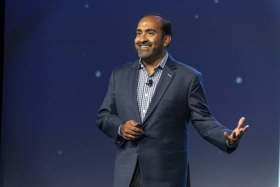 Headshot: Rohit speaking in action