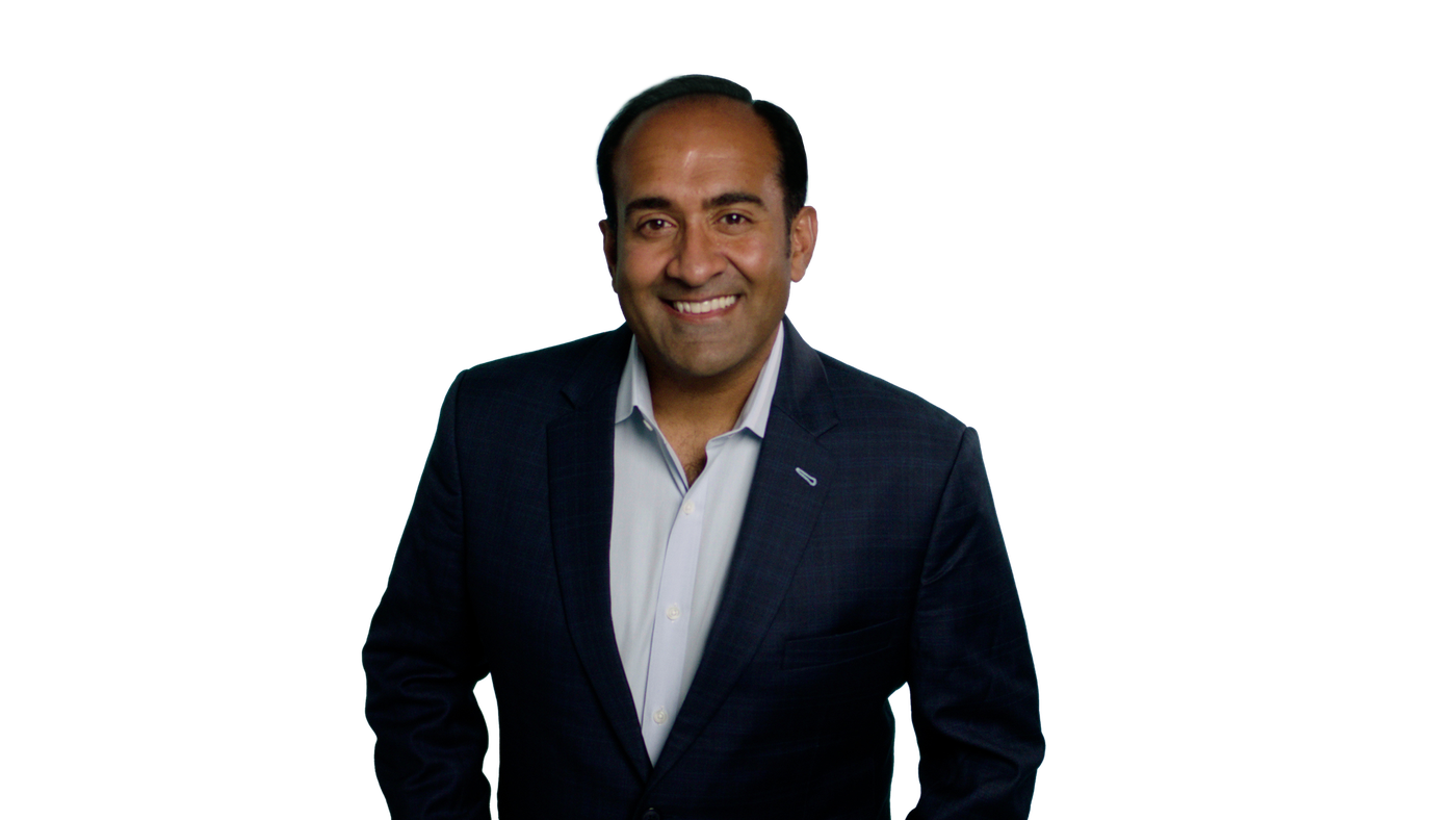 Headshot: Rohit in a suit, transparent background